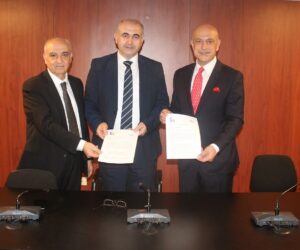The three signatories for the MOU