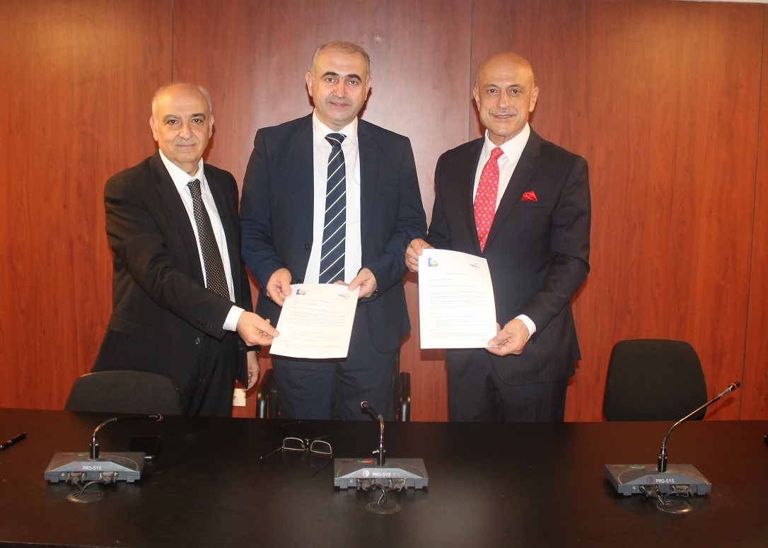 The three signatories for the MOU